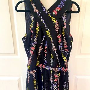 BCBGMaxAzria black and floral romper size M